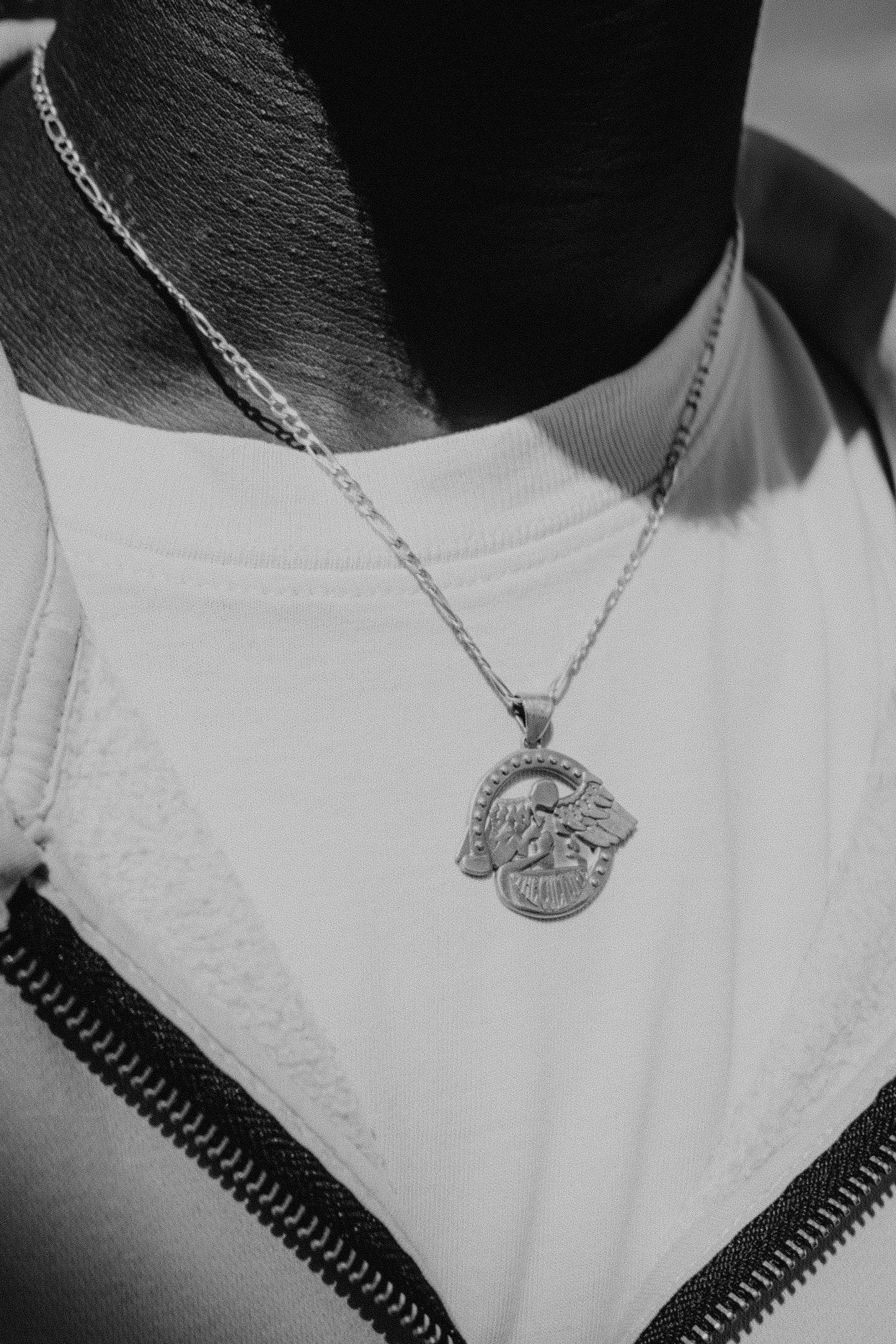 THE CULTURE SILVER PENDANT
