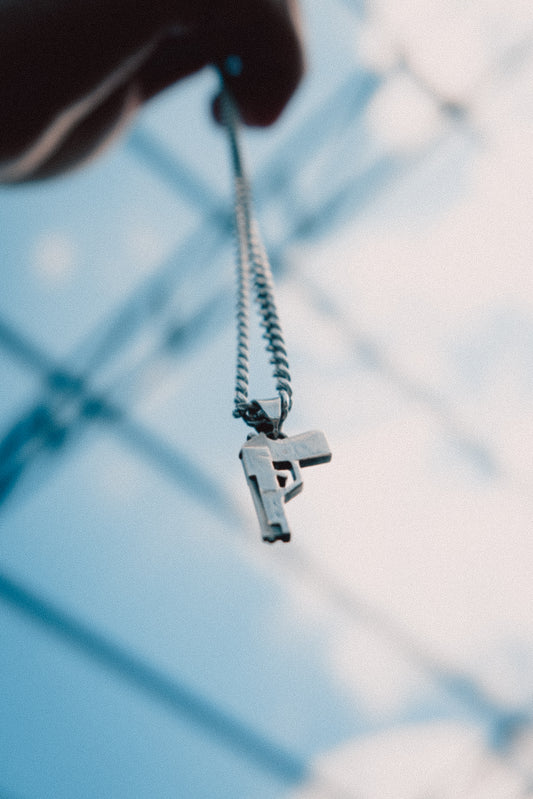 SMALL PISTOL SILVER PENDANT